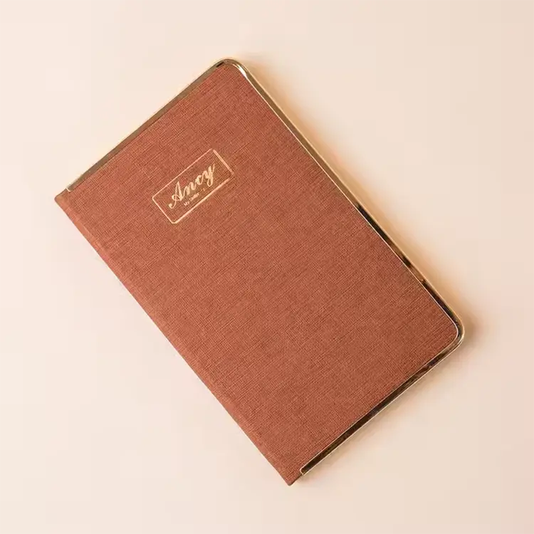 Cuaderno de metal borde